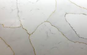 Replacing your outdated counters with quartz can turn a nice kitchen into a stunning one, but is it right for your home? Gold Calacatta Quartz Worktops From Mayfair Granite