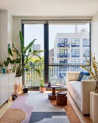Forge a concrete paradise with living walls astride couches. Tour A Brooklyn Apartment Full Of Bold Color And Cheerful Decor Architectural Digest