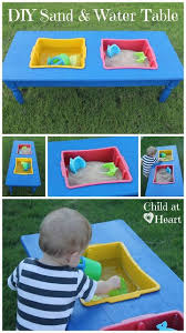 Diy Upcycle Sand And Water Table Tutorial Diy For Kids Sand And Water Table Kids Playing