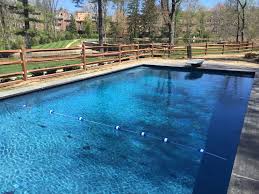 Water Color Primera Stone Sapphire Treasure Ivory Toned Pebbles Combined With A Generous Amount Of Blue Glass And Ocean Shells Pool Pool Finishes Spa Pool