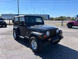 Image result for Brilliant Black 2003 Jeep