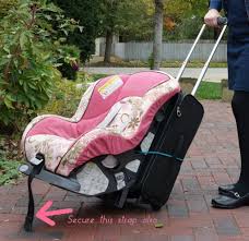 Easy Way To Secure A Car Seat To A Suitcase Use A Snug Fitting Bungee Cord One Thing Less To Carry Through The Toddler Travel Car Seats Traveling With Baby