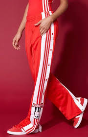 Black And Red Adidas Joggers Adidas Combine Edgy Streetstyle With Comfort In Their Adicolor Red Tearaway Track Pants These Casu Red Adidas Pants Red Adidas Outfit Sport Pants Street Style