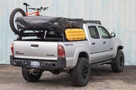 What kept that from tipping forward and backward? Tacoma Bed Rack Modular Base Mid Size Truck Bed Rack Victory 4x4