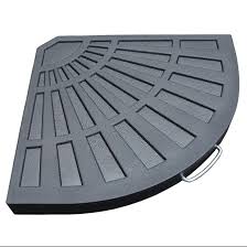 The patio table has a hole in the middle of the table to hold the umbrella upright, while the base keeps the umbrella from taking off during a gust of wind. Allen Roth Concrete Filled Resin Weight Offset Umbrella Base 18 1 2 In Grey Sj812 Rona