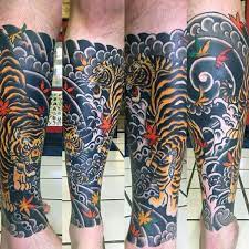 70 Japanese Tiger Tattoo Designs For Men Masculine Ideas Japanese Tiger Tattoo Tiger Tattoo Sleeve Japanese Tattoos For Men