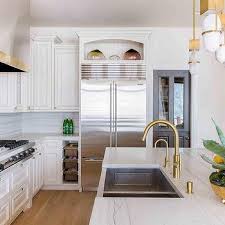 Franke kitchen uses fireclay sinks material that is very easy to clean. Stainless Steel Sink With Gold Faucet Design Ideas