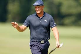 Bryson dechambeau, with a raucous gallery behind him, on the way to a birdie on the eighth hole during the third round of the bmw championship on saturday. Jdzltxkp 23pjm