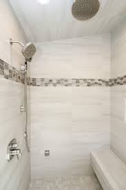 Versatile in design and function, ceramic flooring and ceramic wall tiles remain one of the most popular choices for bathroom tile trends 2020. Gray And White Marble Tile With Picket Multicolored Accent Tiled Shower Bathroom Redesign White Tile Shower Bathroom Remodel Shower