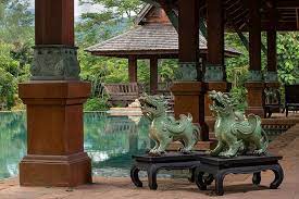 A mystic knot feng shui design in a tassel adds to its protective and good luck energy, as does the auspicious feng shui power of the color red. Celadon Ceramic Lucky Foo Dog Statues Buy Thai Ceramics