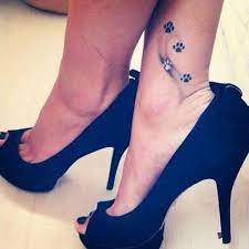 Dog Print Tattoo On Upper Ankle Ankle Tattoos For Women Tattoos Pawprint Tattoo