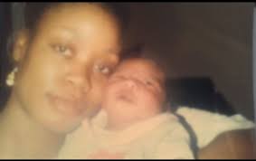 Can anyone make this picture of my mom and me more clear?