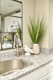 Granite countertop price is a factor to consider when you want to install custom granite countertops in your kitchen and bathroom makeover. Kitchen Corner Granite Countertop Corner Faucet Details Interiors