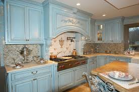 With colors taken straight out of the provençal landscape, rustic accents, and that general je ne sais quoi, french and, though you can't see them here, he also tucked two matching blue stools from the paris flea under the island. Home Living Blog French Country Kitchen Blue