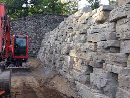 There are large types, small types, flat types, round types, and irregularly shaped types. Create A Natural Looking Retaining Wall With Boulders And Rocks From Our Landscape Supply In Rockland County Nj Area E P Jansen Nursery Stoneyard