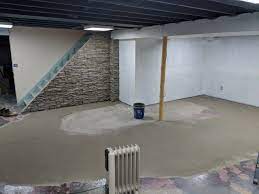 In this quick tutorial we demonstrate techniques for installing floor leveler and how to do multiple coats to solve any problem you may be facing. How To Finish A Basement A Little Diy Basement Flooring Bathroom Concrete Floor Basement