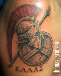 A trojan warrior, spartan ancient greek or roman gladiator helmet. Roman Shield And Helmet Tattoo By Thomas Jacobson Spartan Tattoo Helmet Tattoo Tattoos