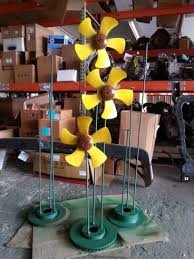 Many of our metal yard art animals come in different sizes to fit your space and your budget. Old Fan Blade Flowers Scrap Metal Art Yard Art Metal Yard Art