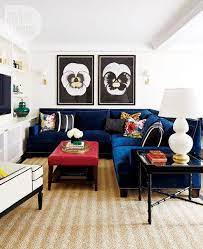 Get a great look for your living room by adding two dark grey chairs some colorful throw pillows. New Design Neutral The Blue Sofa Blue Couch Living Room Velvet Sofa Living Room Blue Couch Living