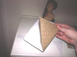 You can make a simple pyramid out of cardboard or paper. How To Make An Egyptian Pyramid Feltmagnet