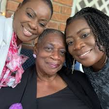 Sha'Carri Richardson's Grandmother Stands Proudly In Front of Her Picture.  #TheBigIcon⭐️