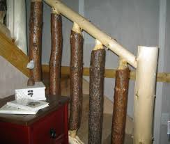 With just a few small details left to wrap up in my house renovation, the largest of these was to put a railing on the stairway that goes down to the family room from the main floor. How To Make Log Railings For Your Rustic Cabin Stairway Dengarden