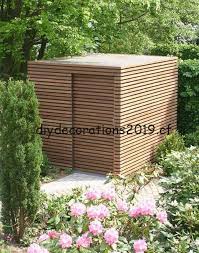 Maisons De Jardin Avec Revetement En Bois A Fmh Decoration Modern Garden Design Modern Garden Garden Storage