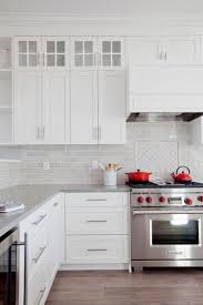 So would i just start at the countertop and tile up as far as i can go one last thing, what do you guys do under the cabinet, 1/8 gap and caulk it or just run the tiles right underneath the. 34 Awesome White Kitchen Design And Layout Ideas Kitchen Cabinet Design Farmhouse Kitchen Cabinets Kitchen Design