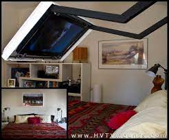 This Flip Out Tv Mount Lets You Hide Your Tv Behind A Mirror Or Painting Tv In Bedroom Bedroom Tv Wall Tv Wall
