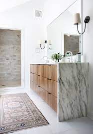 Vanity with round mirror, vanity with stool. Waterfall Edge Bathroom Archives Park And Oak Interior Design