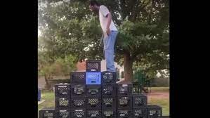 The milk crate challenge calls for stacking milk crates in the shape of a pyramid and successfully walking up one side and down the other. Tvg Bd9gdkldfm