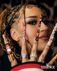 A Flo of Her Own At her first-ever Olympic race, in Paris, 24-year-old Sha'  Carri Richardson was less than half a second from breaking Flo-Jo's  100-meter record; and at the World Championships