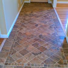 A Tile Entry Worthy Of Attention Prosource Wholesale An Intricate Design Spices Up A Tile Entryway Entryway Tile Foyer Tile Ideas Flooring