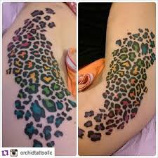 Dont forget to rate and comment this tatto!! Pin For Later 90s Girls Will Obsess Over These Colorful Lisa Frank Tattoos Cheetah Print Tattoos Leopard Print Tattoos Leopard Tattoos