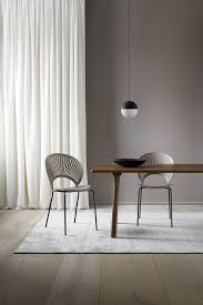 The Precise Transparency Of The Trinidad Chair Almost Dissolves In A Play Of Light And Shadow Yet At Th Luxury Dining Room Furniture Design Dining Room Design