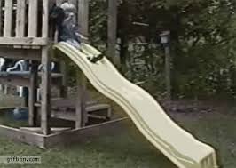 Kid bangs head while coming down slide. Kid Going Down Slide Gifs Tenor