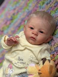 ADOPTED** thank you! Reborn Lil Jude is available for adoption. He has  light blonde rooted hair, grey glass eyes, magnetic pacifier. He wears  newborn clothing. All info is