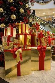 Order from a wide range of artificial and decorative christmas trees now a days artificial christmas trees are also available in market and online shops with christmas tree decorative items. Christmas Tree With Gifts Mall Neu Isenburg Hesse Germany Christmas Display Christmas Tree Shop Christmas Shop Window