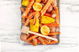 Cook, stirring often and skimming and discarding any froth or foam that forms, until steam begins to rise from the surface but the liquid does not boil. Seafood Boil Recipe Couple In The Kitchen