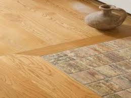 I taped off the wood to try to keep it clean from mortar before installing my strata_mat xt and tile. The Combination Of Tiles And Laminate In The Hallway 63 Photos A Combined Design Of The Floor With Tiles In The Hallway Reviews