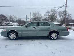 Image result for Light Ice Blue 2006 Town Car