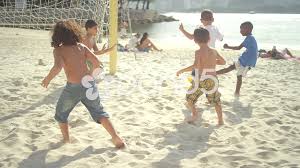 Kids love to the play at the beach and much of that play involves exploring and discovering. Kids Playing Soccer On A Beach In Brazil Stock Video Pond5