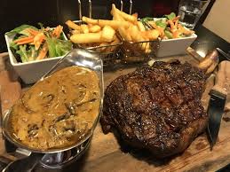 Can You Cook Bacon In The Microwave Reddit A Tomahawk Steak With Mushroom Gravy And A Side Of Fries With Salad Now This Is A Balanced Dream Dinner Garlic Herb Butter Food Herb Butter