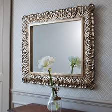 With a warm honey finish, the frame is unassuming and unintrusive, but its personality and depth is apparent. Home Decor Mirrors Design Corral