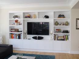 Built in shelves units are nice since they are connected to keep storage in a particular place. L Shaped Couch Tv Cabinet Built In Units Book Shelves Wall Unit Ideas Hanging For Living Room Inch St Built In Wall Units Built In Tv Cabinet Wall Unit Designs