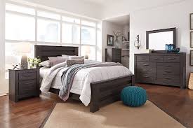 Black plastic legs complete the look. Brinxton Nightstand Ashley Furniture Homestore