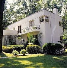 Art deco is an art, architectural, and design style characterized by bold, geometric patterns and shapes, symmetrical arrangements, glamor, luxury, and the use of if you love history, art, and design and want to take style notes from art deco architecture, scroll through the 14 striking examples below. An Art Moderne Restoration Old House Journal Magazine Art Deco Buildings Art Deco Architecture Art Deco Home