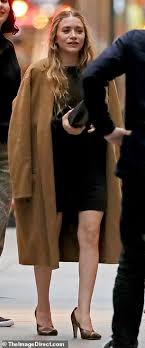 Download and print in pdf or midi free sheet music for double trouble by john williams (satb choir+piano) arranged by beautifulmusicfreak for piano (mixed quintet). Ashley Olsen Wears A Black Dress As Sister Mary Kate Rocks A Black T Shirt For