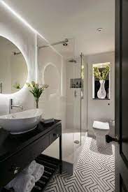 The black and white color scheme makes everything look a lot more striking, beautiful, sleek and refined. 25 Incredibly Stylish Black And White Bathroom Ideas To Inspire White Bathroom Designs Black White Bathrooms White Bathroom
