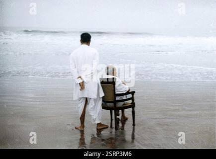 Mahatma Gandhi sitting on chair at Juhu Beach, Bombay, Mumbai, Maharashtra, India, Asia, May 1944, old vintage 1900s picture Stock Photo - Alamy